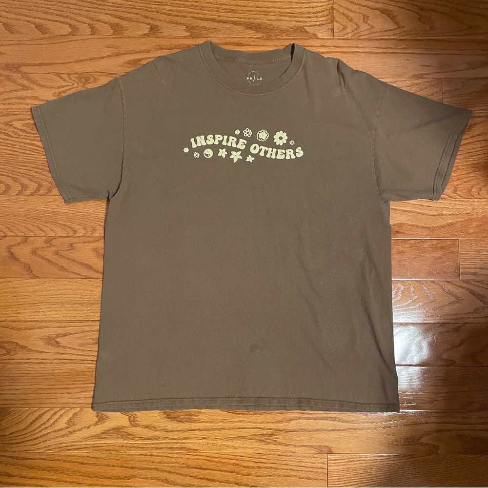Brown and white cotton graphic tee with "Inspire Others" design